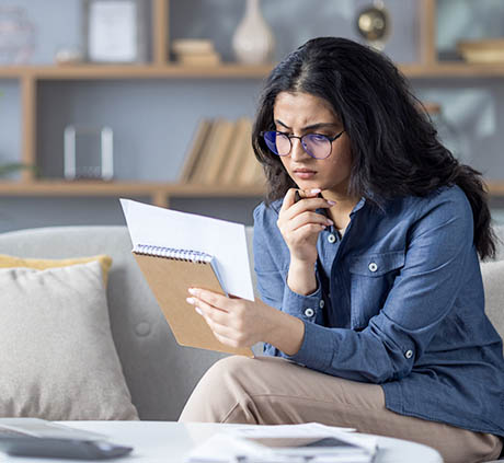 woman-on-couch-with-notebook