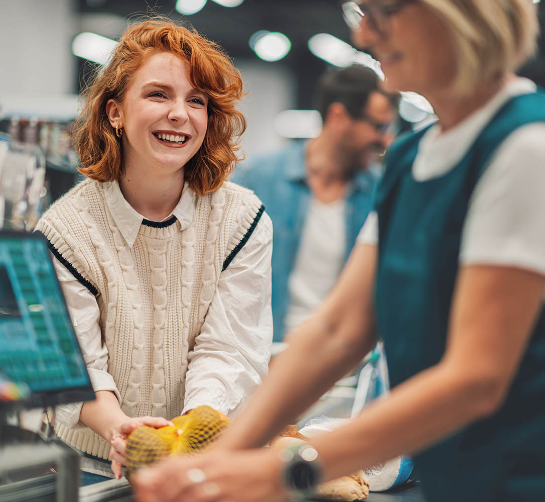 woman-checking-out-at-grocery-store